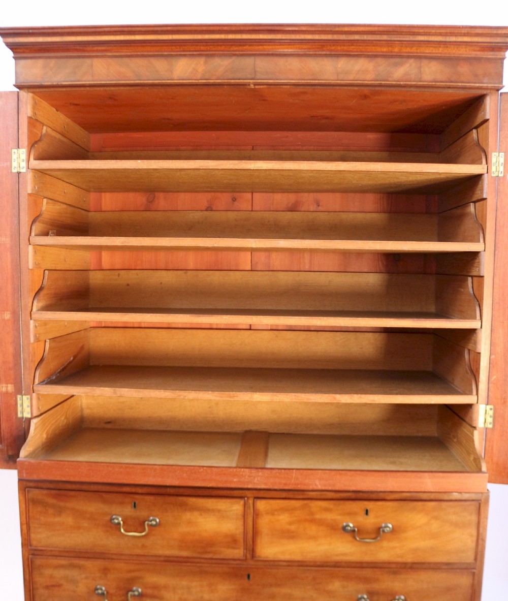 A Fine George 111 Figured Mahogany Linen Press with Sliding Trays View V