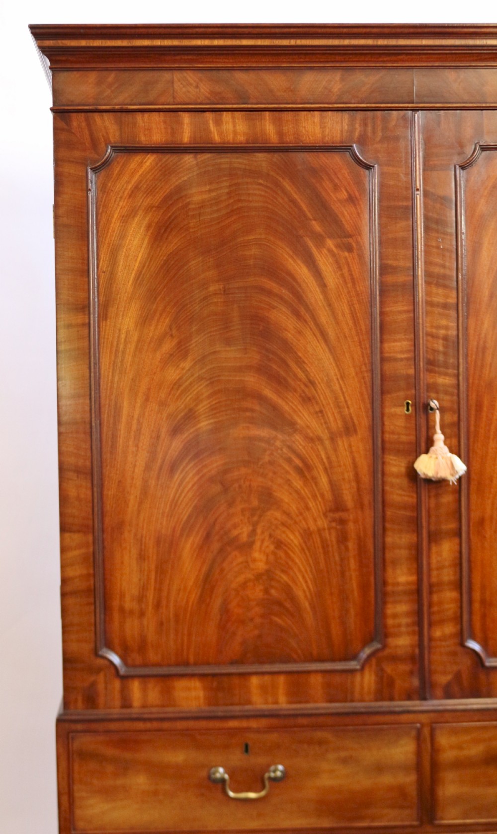 A Fine George 111 Figured Mahogany Linen Press with Sliding Trays View VI