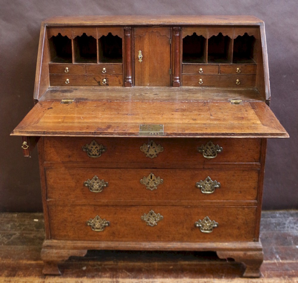 A Fine and Original George 111 Oak 4 Drawer Bureau View II