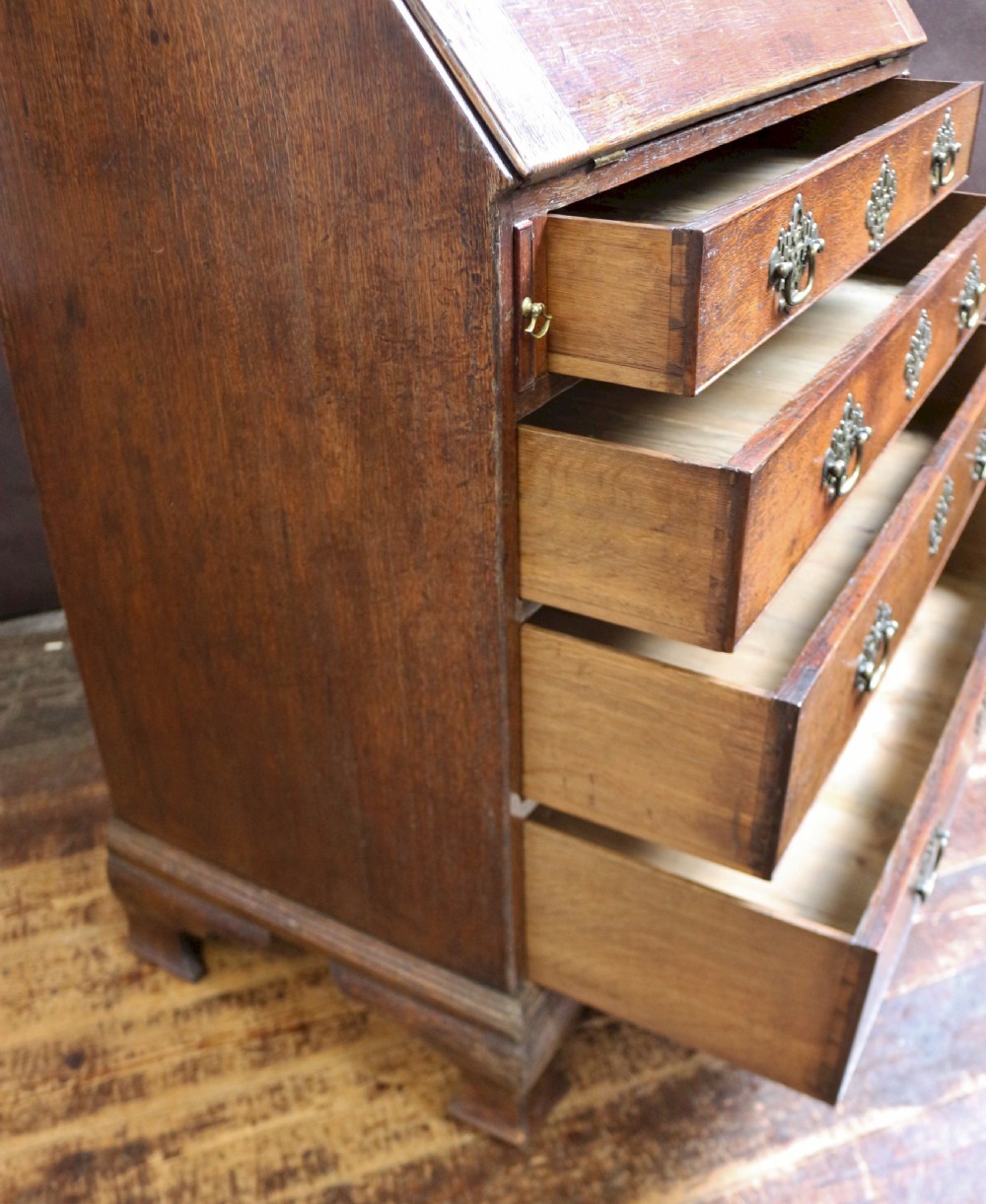 A Fine and Original George 111 Oak 4 Drawer Bureau View IX
