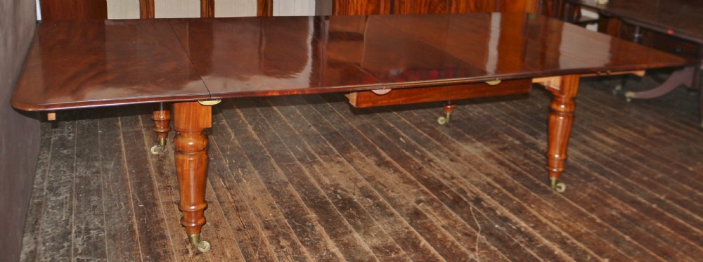 Early Victorian Mahogany Extending Dining Table having 3 Extra Leaves View XII