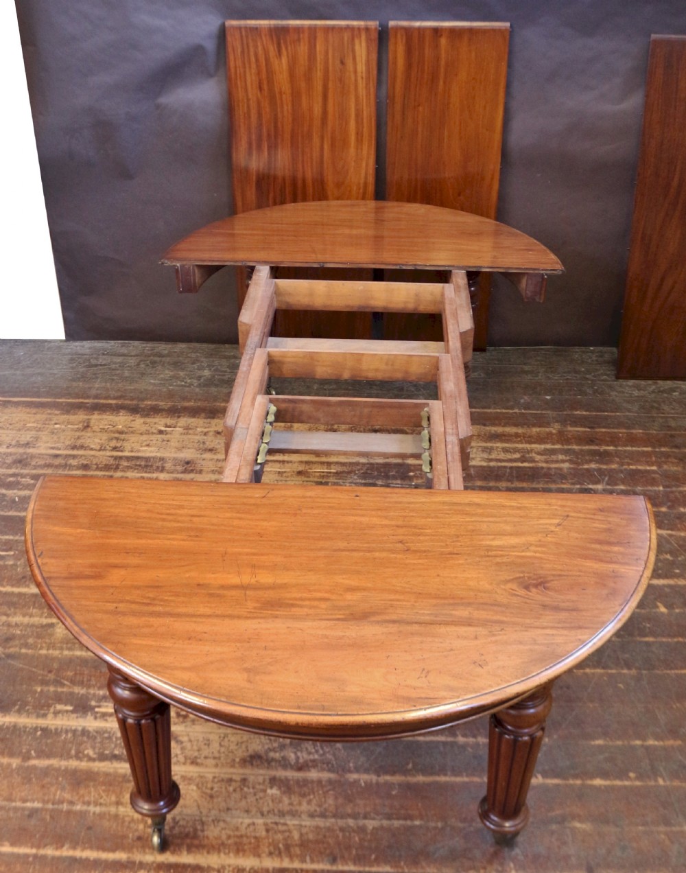 Victorian Mahogany Circular Extending Dining Table with 3 Extra Leaves View V