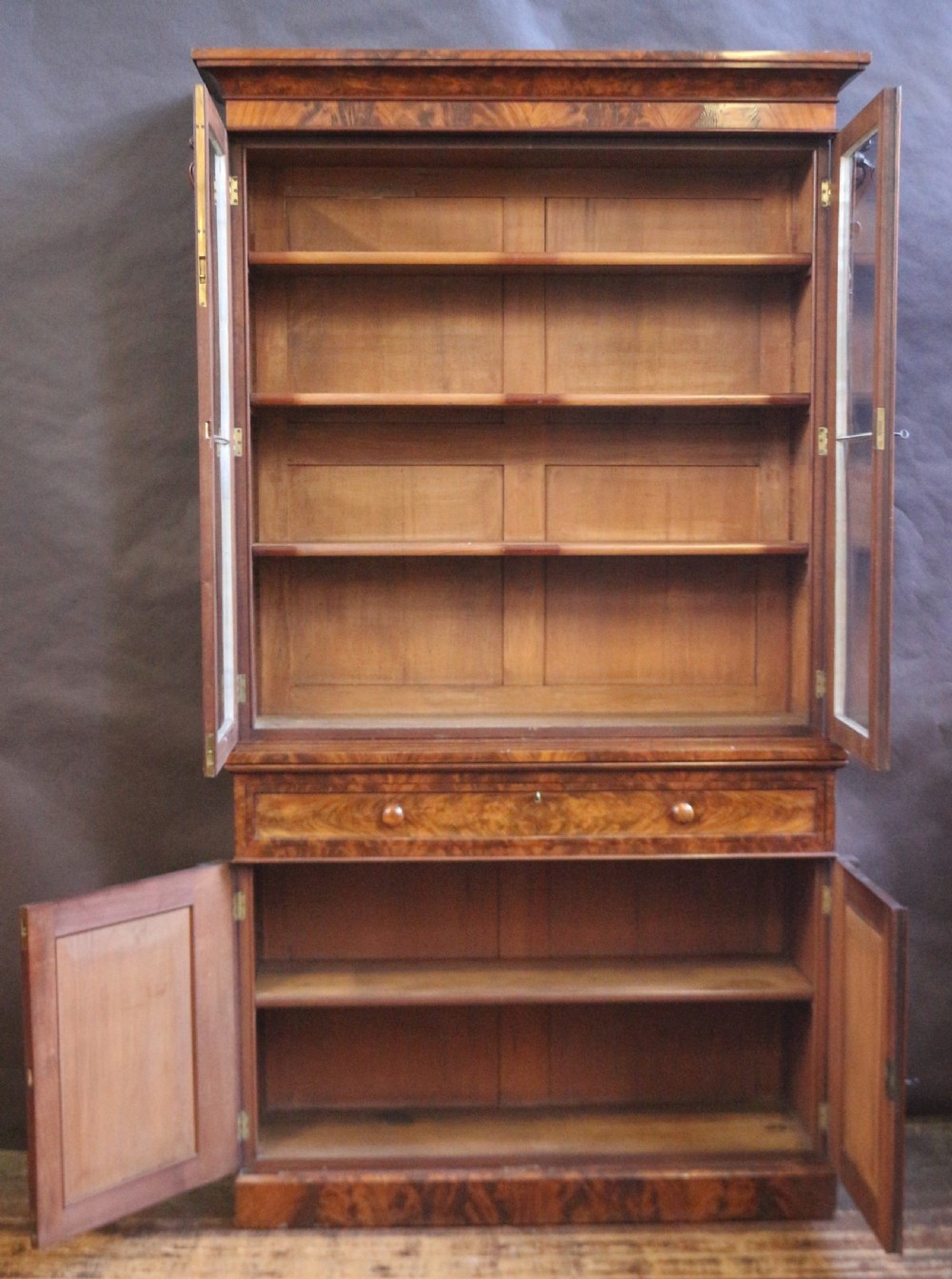 Fine Quality Early Victorian Flared Mahogany Cupboard Base Bookcase View II