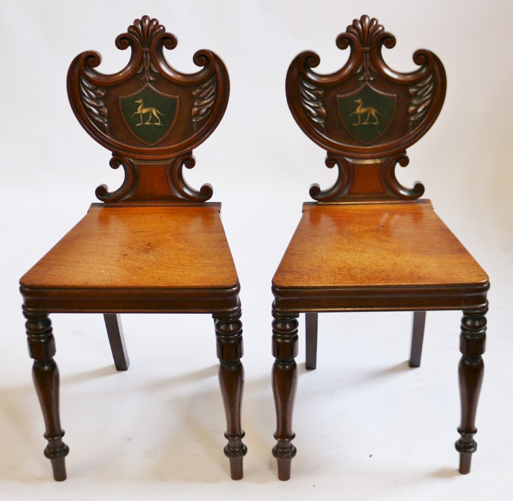 Regency Mahogany Pair of Hall Chairs with Greyhound Crests