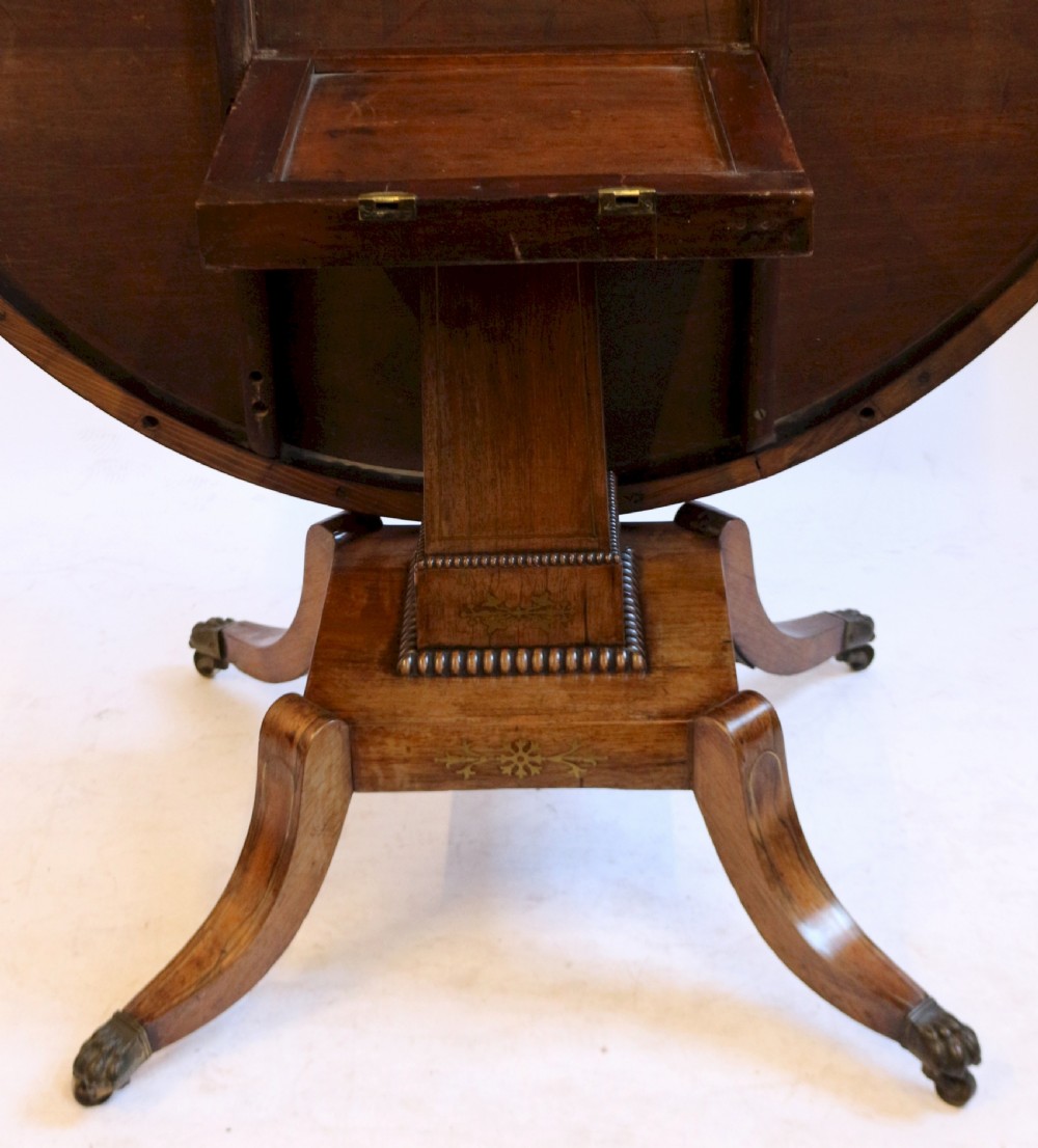 A Fine Regency Rosewood Brass Inlaid Circular Centre Table View VI