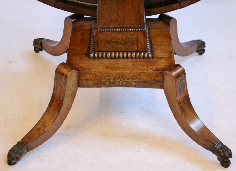 A Fine Regency Rosewood Brass Inlaid Circular Centre Table View VII