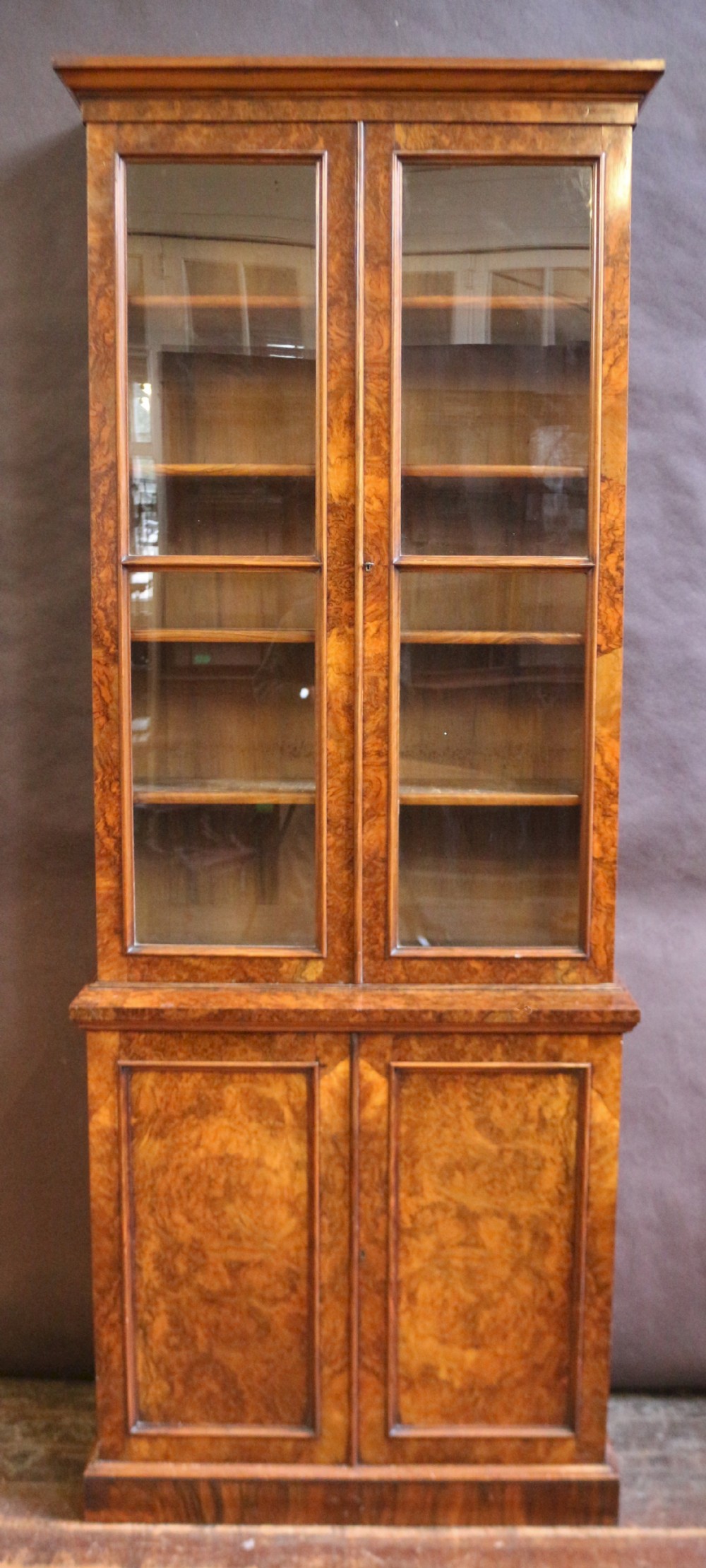 Fine Quality Victorian Figured Walnut Slim Cupboard Base Bookcase.