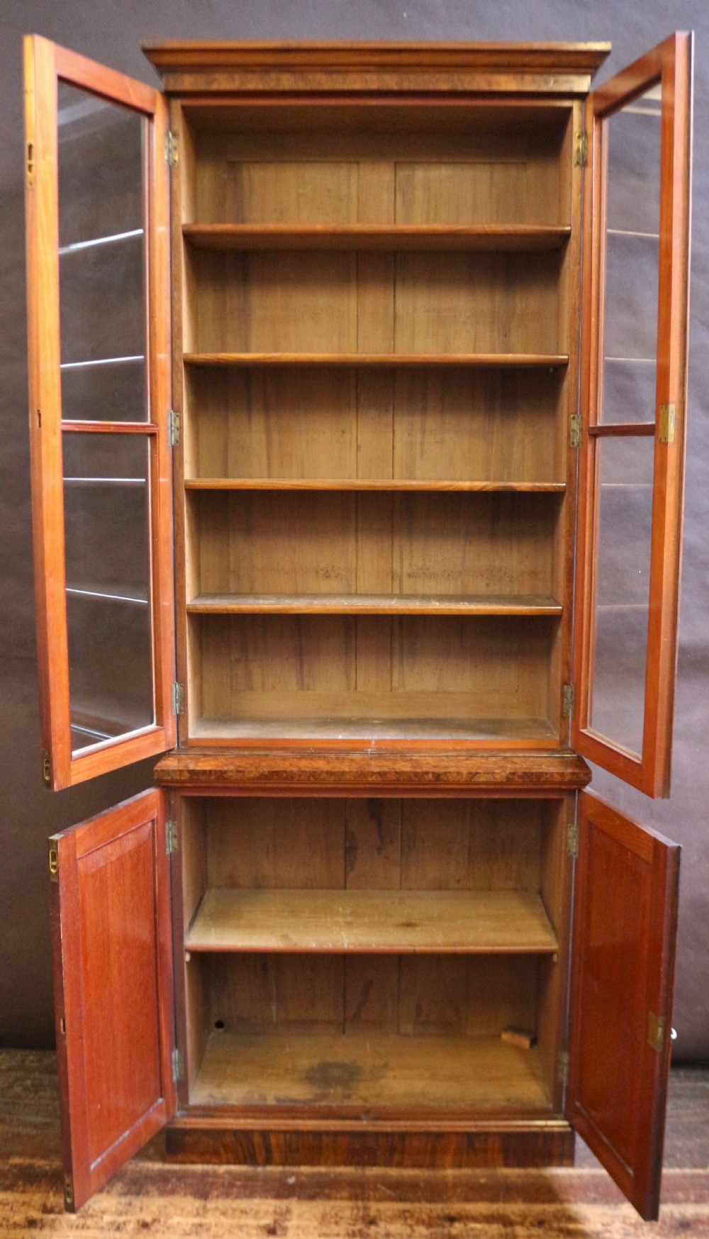 Fine Quality Victorian Figured Walnut Slim Cupboard Base Bookcase. View II