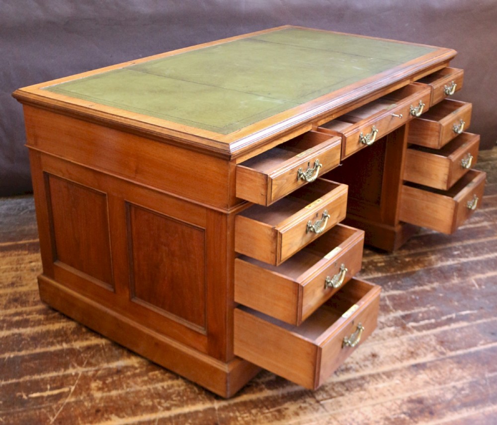 Late Victorian Solid Walnut 5' Kneehole Desk having 9 Mahogany Lined Drawers View III