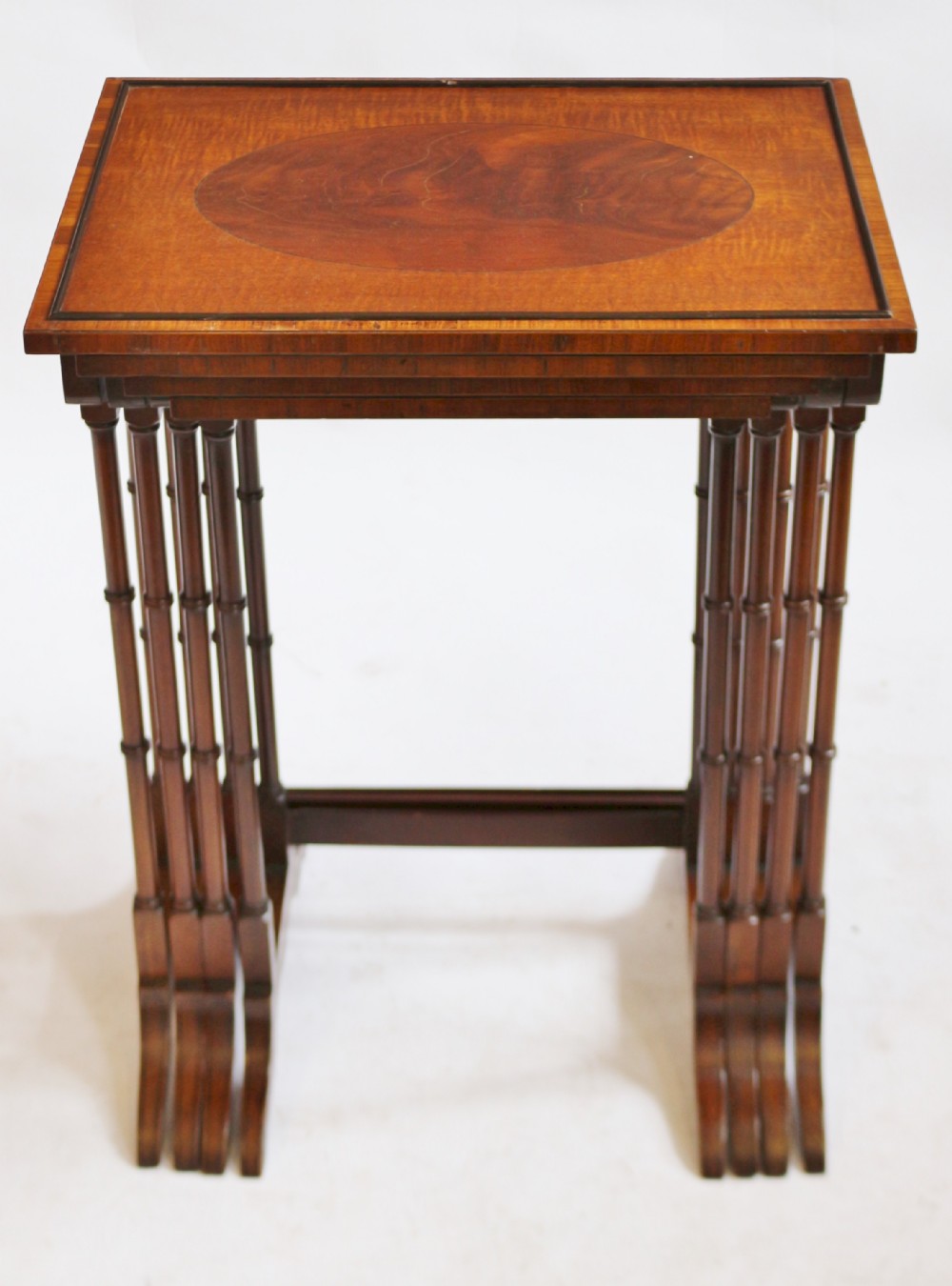 Edwardian Feathered Mahogany Nest of 4 Tables