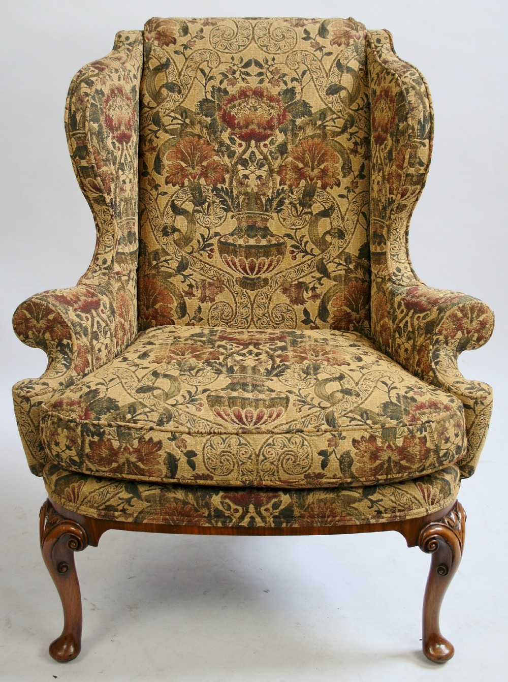 C1920. Walnut Framed Shaped Wing Chair on Cabriole Legs