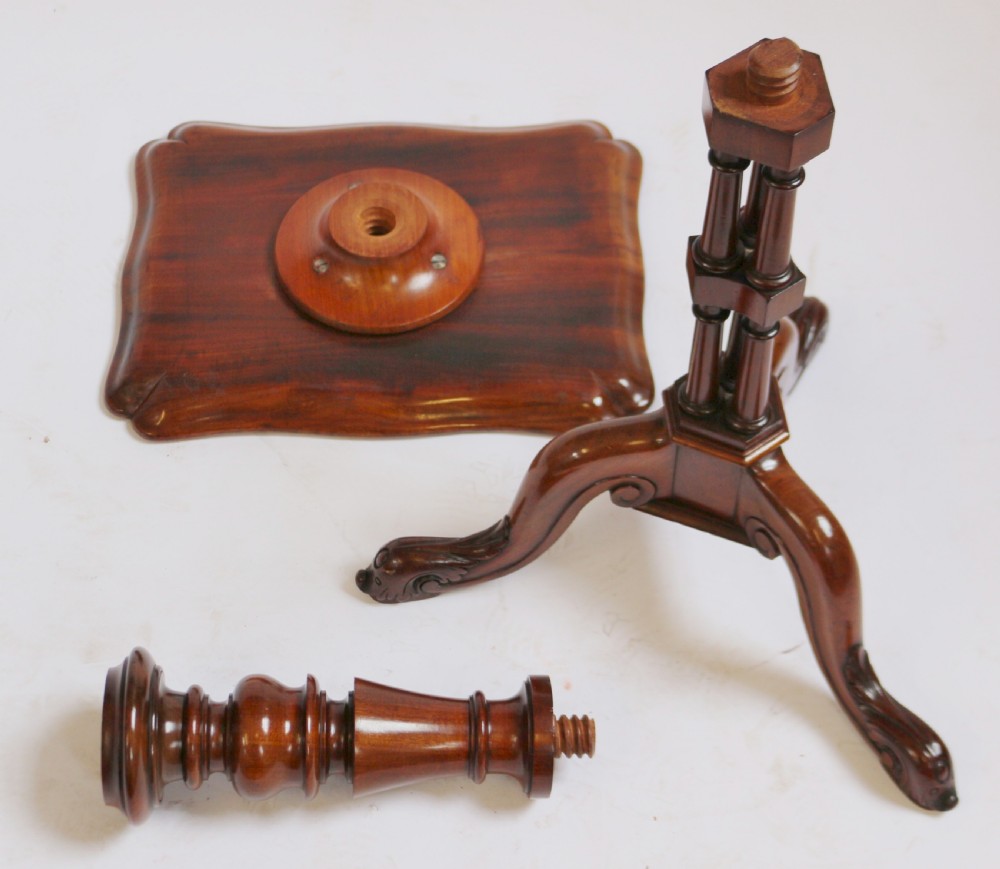 A Regency period thuyawood tripod table featuring a scalloped tray top, turned pedestal stem with clustered columns, and three scrolled feet. View X