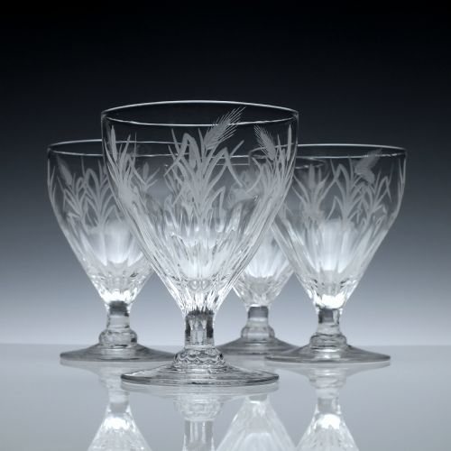 A Set of Four Engraved 19th Century Petal Moulded Glass Rummers C1800