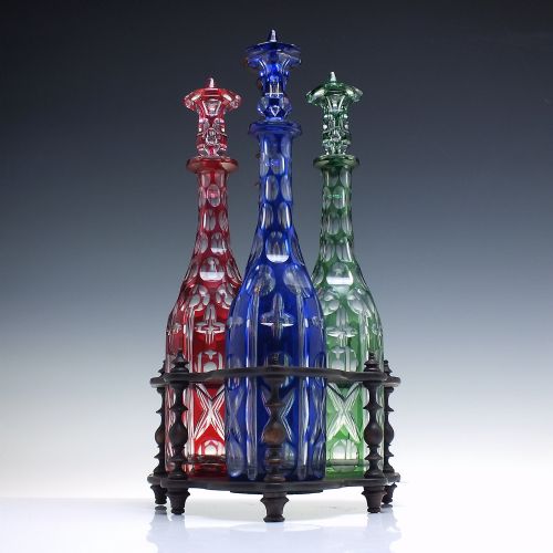 victorian harlequin blue red green glass decanters in rosewood stand c1870 - CATEGORY: ANTIQUE GLASS - DATED 1870