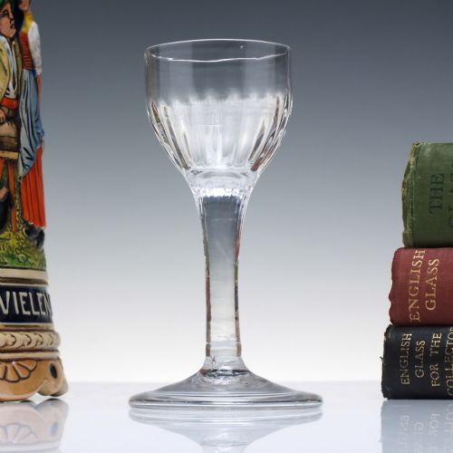 GEORGIAN PLAIN STEM WINE GLASS WITH RIBBED BOWL AND FOLDED FOOT C1740