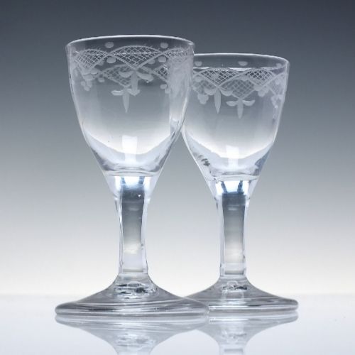 PAIR 18TH CENTURY ENGRAVED WHISKY DRAM GLASSES C1740 WITH FOLDED FEET