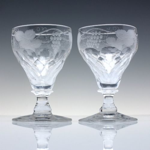 fig 2. A set of six vintage clear glass port goblets featuring wheel-engraved grapevine motifs on pan-topped bowls with cut facet details.