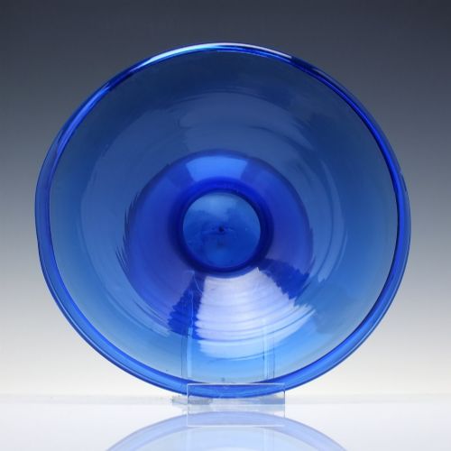 fig 2. A 19th-century cobalt blue glass spittoon with a wide flared rim and a rounded bulbous base.