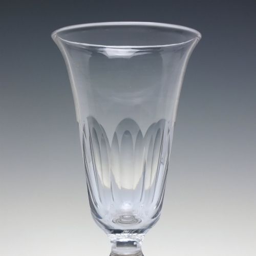 fig 3. A pair of clear cut-glass Georgian jelly glasses featuring flared rims, panel-cut lower bowls, short knopped stems, and circular flat bases.