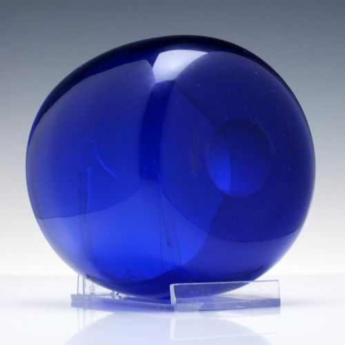 fig 2. A Victorian cobalt blue glass finger bowl featuring a rounded cylindrical form and a smooth rim.