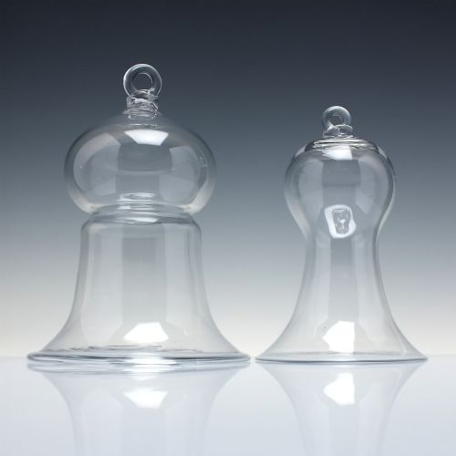 fig 1. A clear hand-blown glass bell cloche dome featuring a looped glass top handle and a flared base rim.