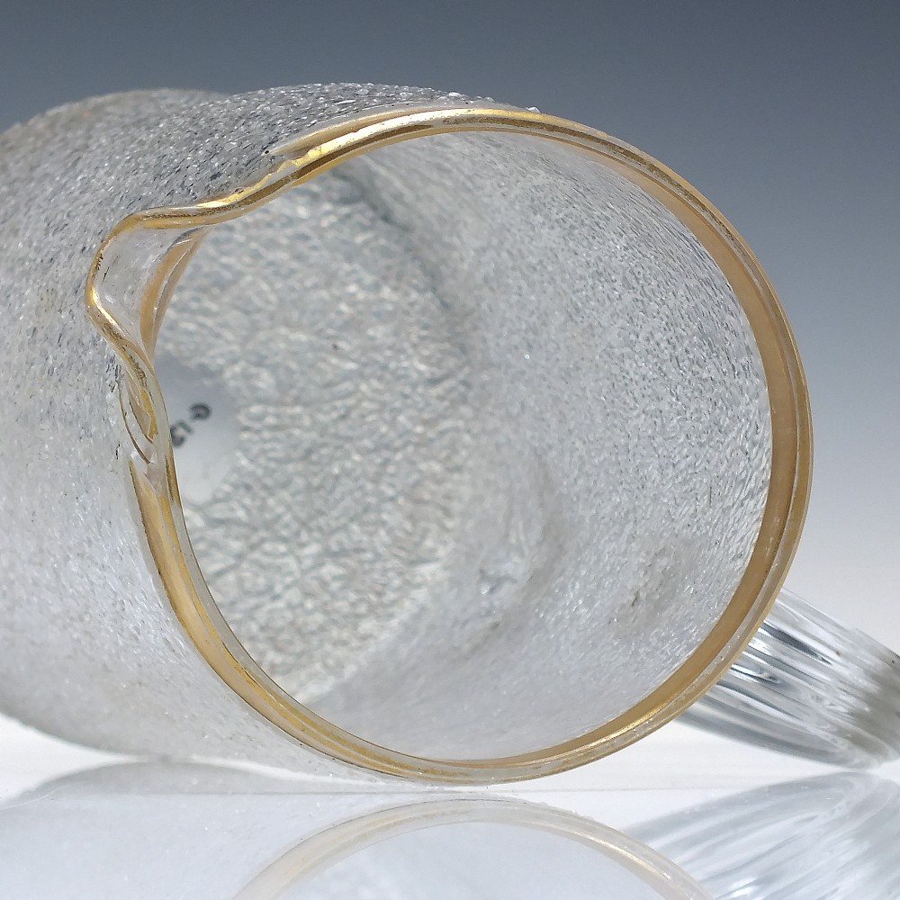 A tall nineteenth-century clear overshot glass water jug featuring a textured ice surface, an applied ribbed handle, and a gilded gold rim. View III