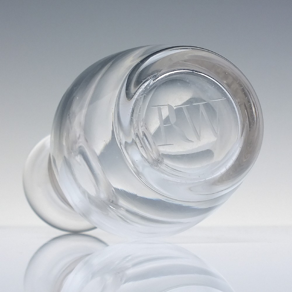 A clear hand-blown glass Scottish whisky measure featuring a flared rim, applied neck ring, and cut shoulder flutes. View IV