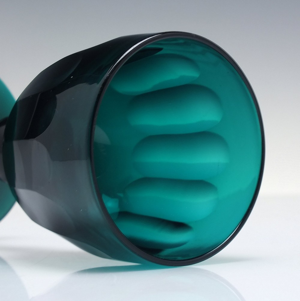 An early 19th-century turquoise green glass wine goblet featuring a cut bowl and a knopped stem on a flat circular base. View IV