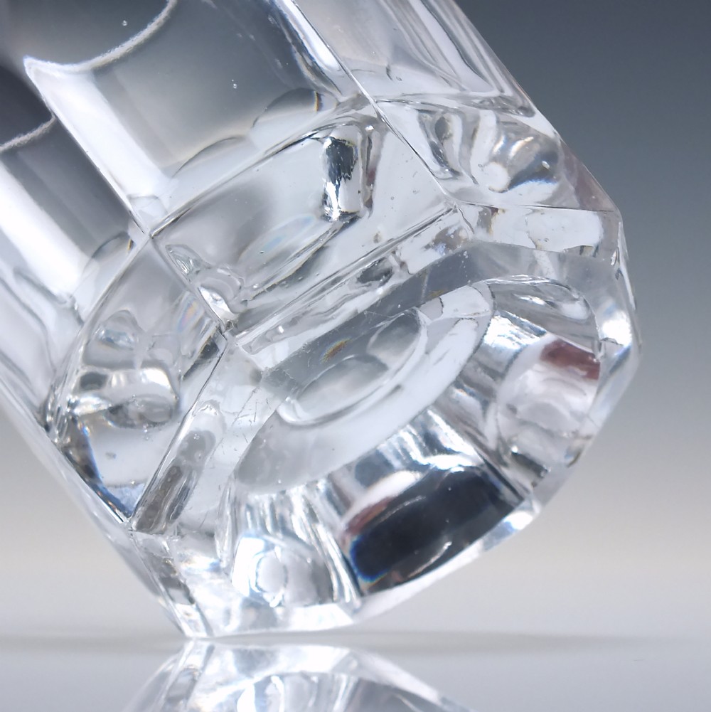 A clear mid-19th-century Victorian glass whisky tumbler featuring fluted panels around the lower body and a thick base. View IV