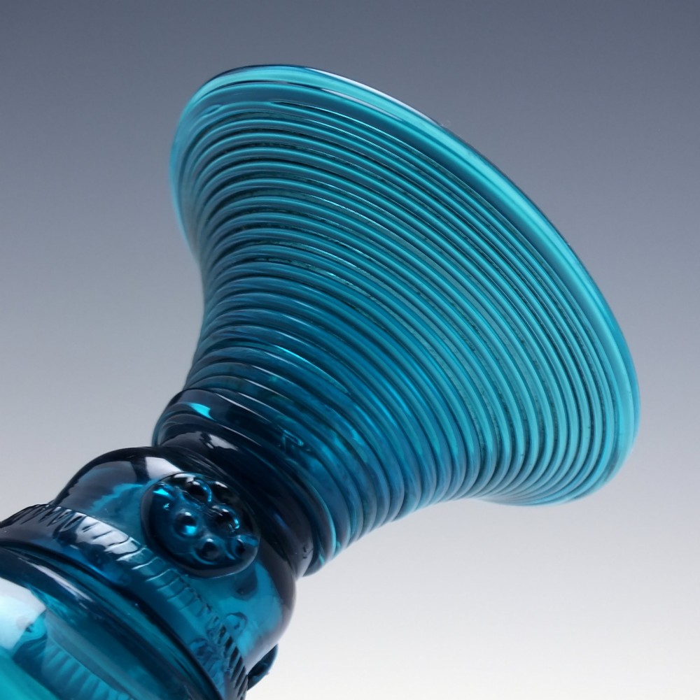 A pair of early 19th-century peacock blue glass roemers with globular bowls, prunted stems, and broad coiled pedestals. View V