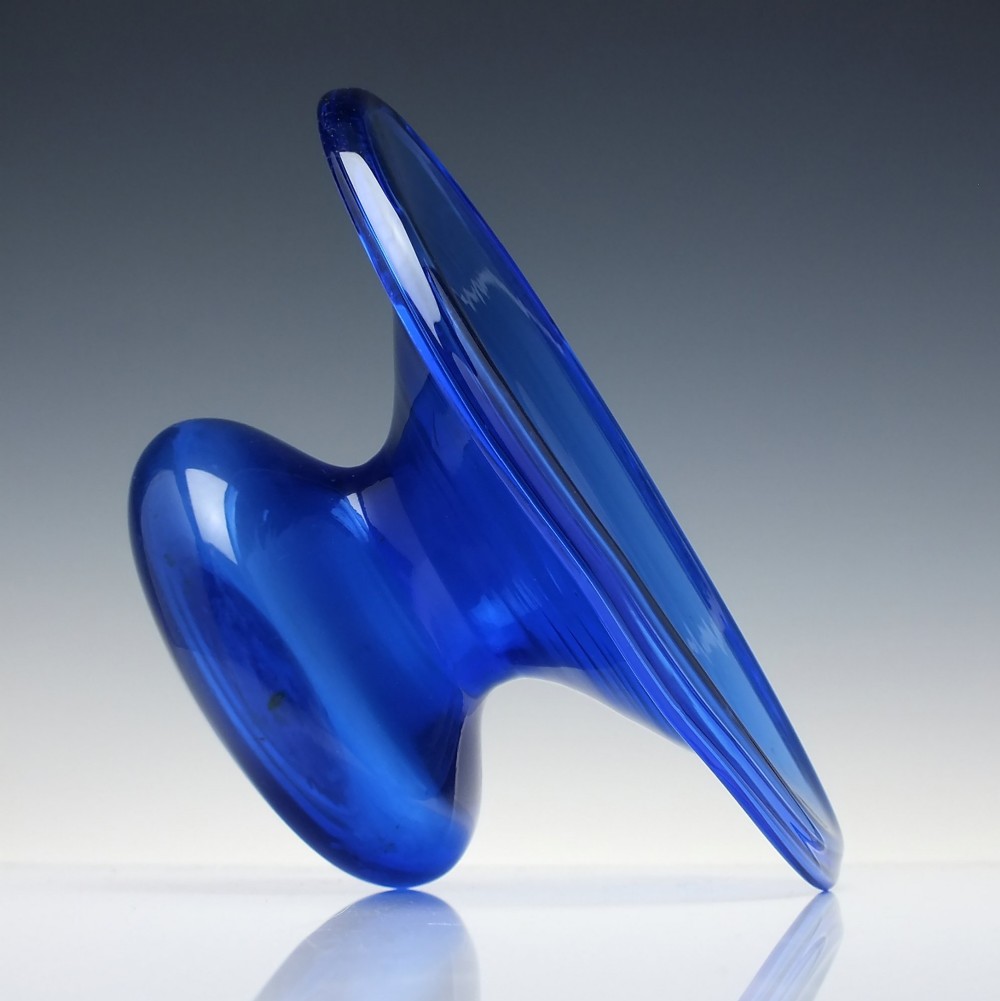 A 19th-century cobalt blue glass spittoon with a wide flared rim and a rounded bulbous base. View IV