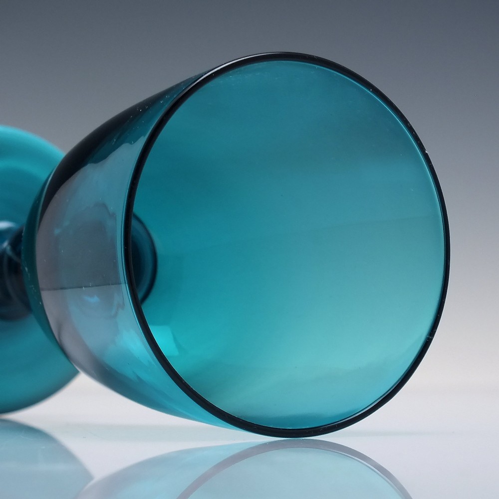 A pair of Georgian teal blue hand-blown glass wine goblets featuring knopped stems and circular bases. View VI