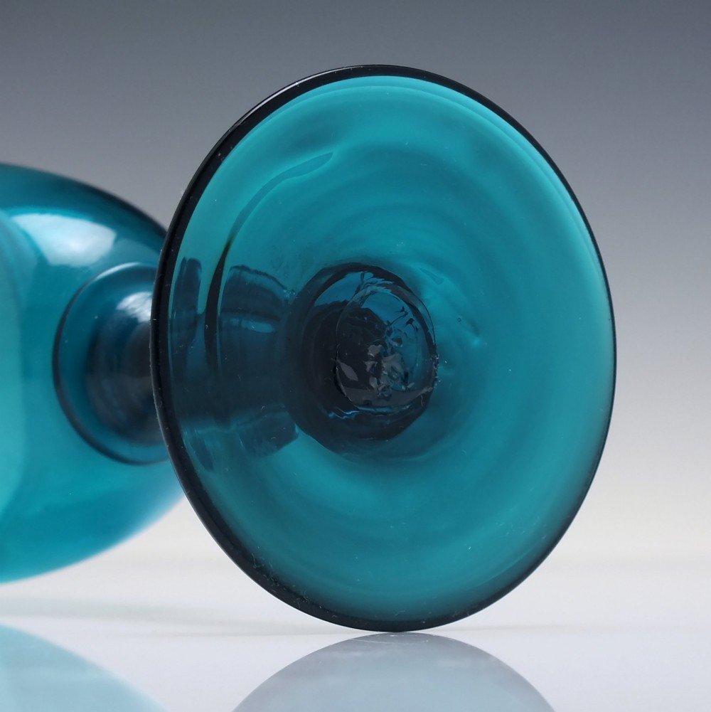A pair of Georgian teal blue hand-blown glass wine goblets featuring knopped stems and circular bases. View VII