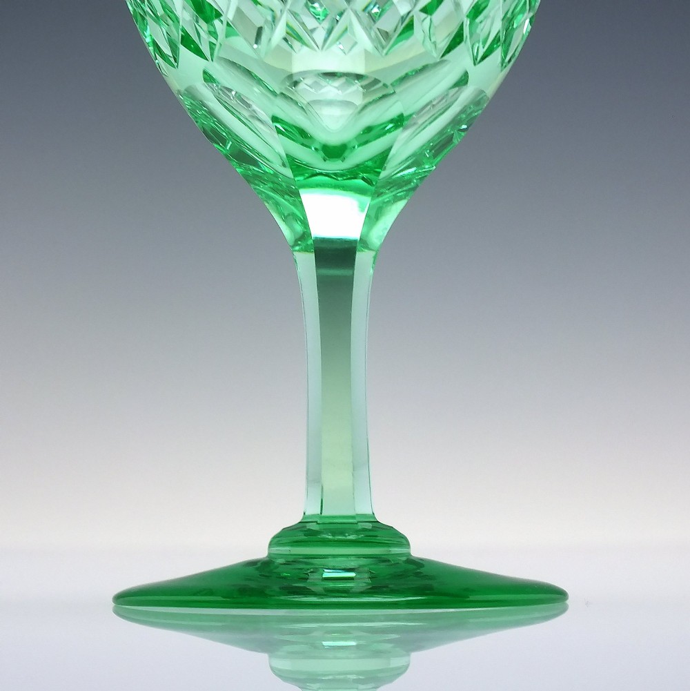 A set of six Victorian light green vaseline glass wine goblets featuring diamond-cut bowls and faceted stems. View VIII