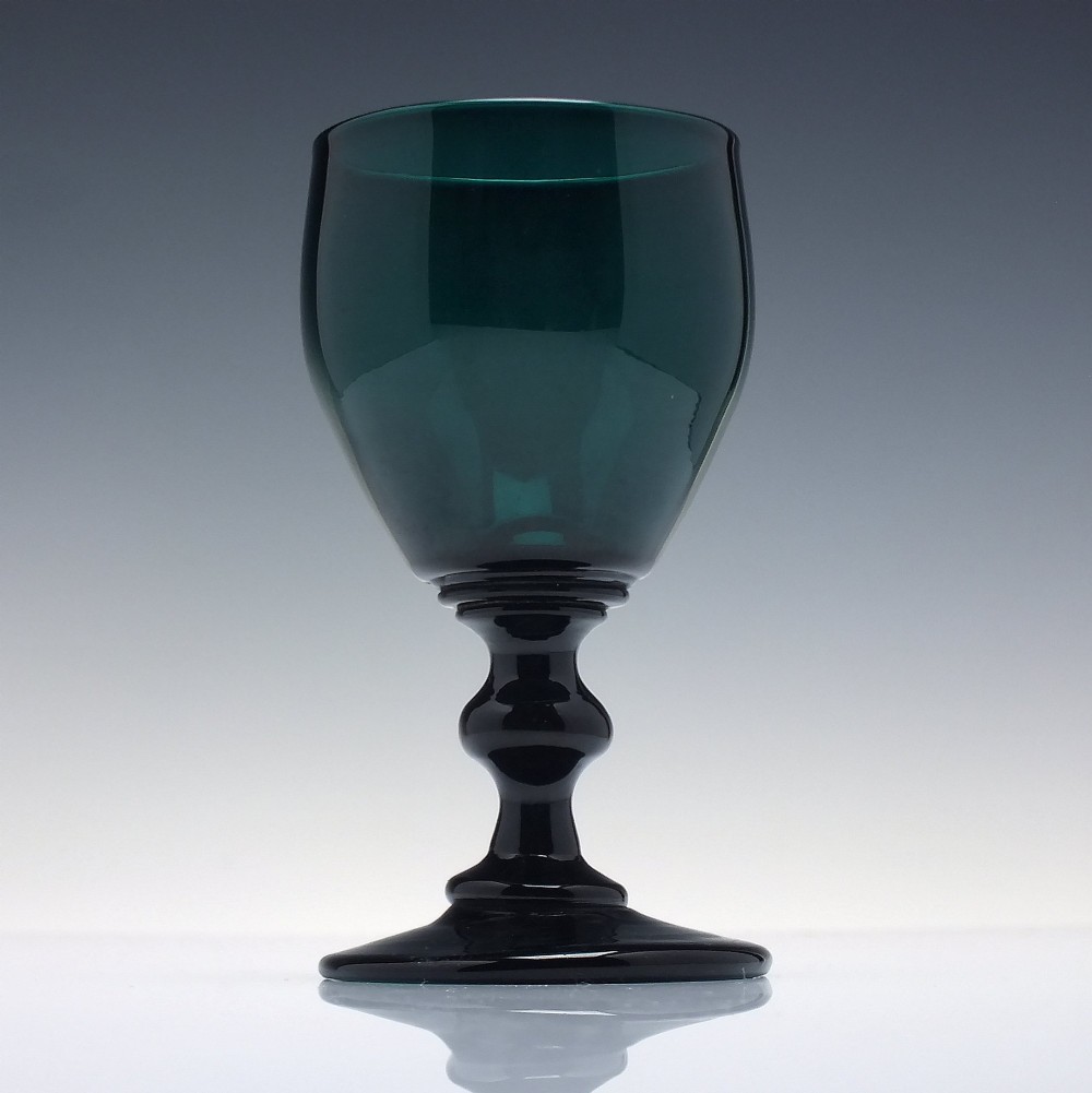 A pair of deep emerald green Georgian hand-blown wine glasses featuring curved bucket bowls, knopped stems, and circular flat bases. View III