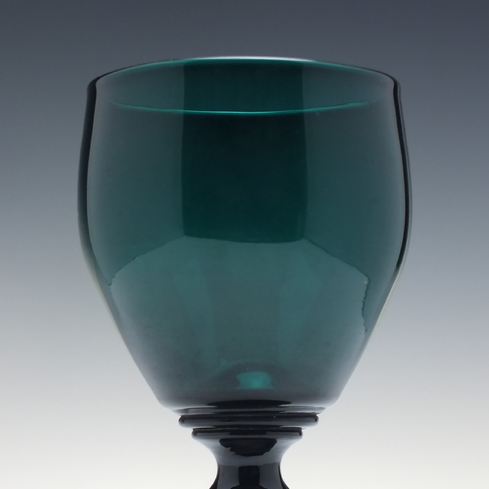 A pair of deep emerald green Georgian hand-blown wine glasses featuring curved bucket bowls, knopped stems, and circular flat bases. View IV