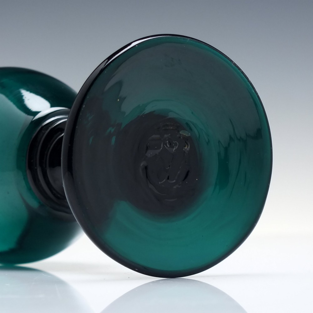 A pair of deep emerald green Georgian hand-blown wine glasses featuring curved bucket bowls, knopped stems, and circular flat bases. View VI