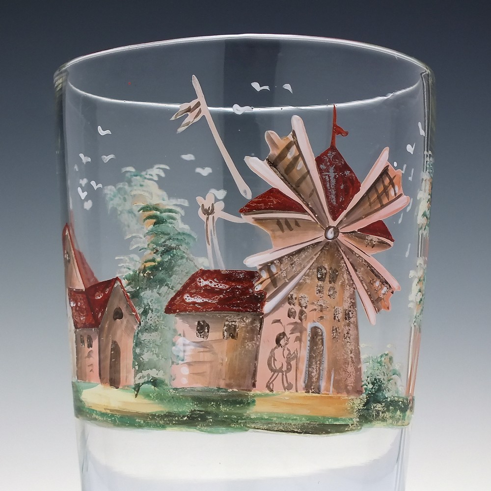 A clear glass tumbler featuring a hand-painted enamel illustration of a windmill and rural cottage. View II