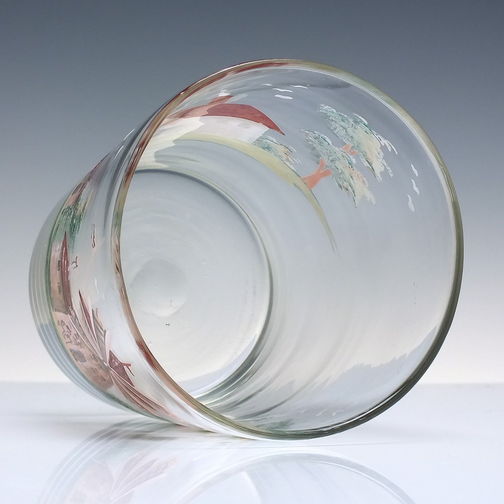 A clear glass tumbler featuring a hand-painted enamel illustration of a windmill and rural cottage. View V