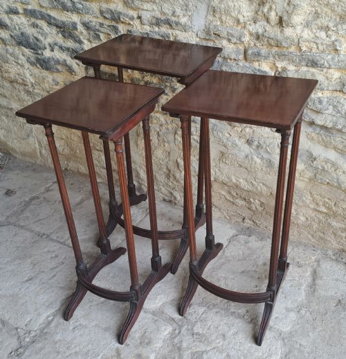 NEST OF THREE MAHOGANY TABLES - ADDITIONAL PHOTO 1