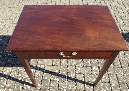 A Georgian mahogany side table featuring a single drawer with a central brass handle and slender square tapered legs. View III