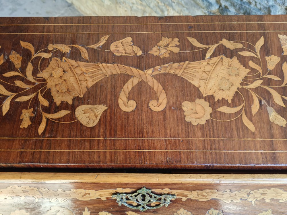 An antique Dutch mahogany writing bureau with intricate floral wood marquetry, a sloped fall front, a single drawer, and cabriole legs. View VIII