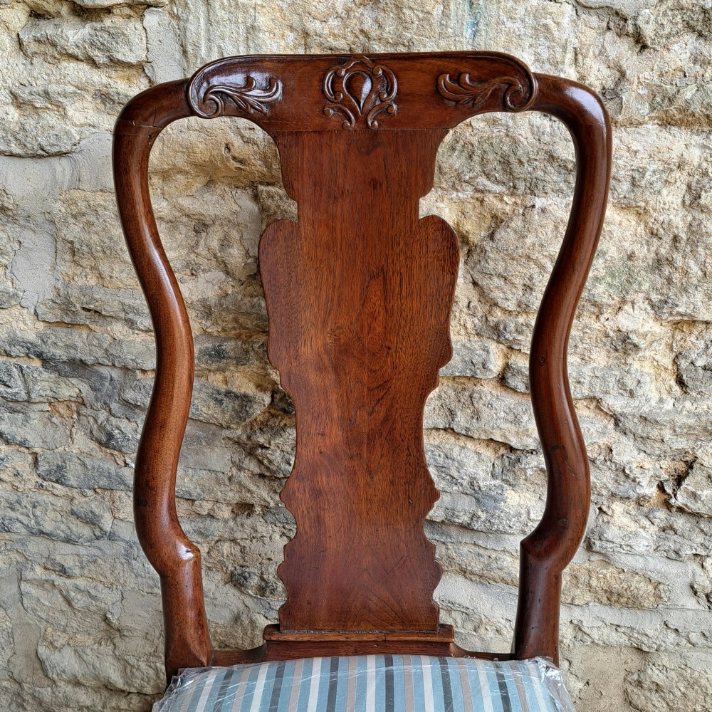 An 18th-century red walnut side chair with a shaped splat back, striped upholstered seat, and carved cabriole legs. View III