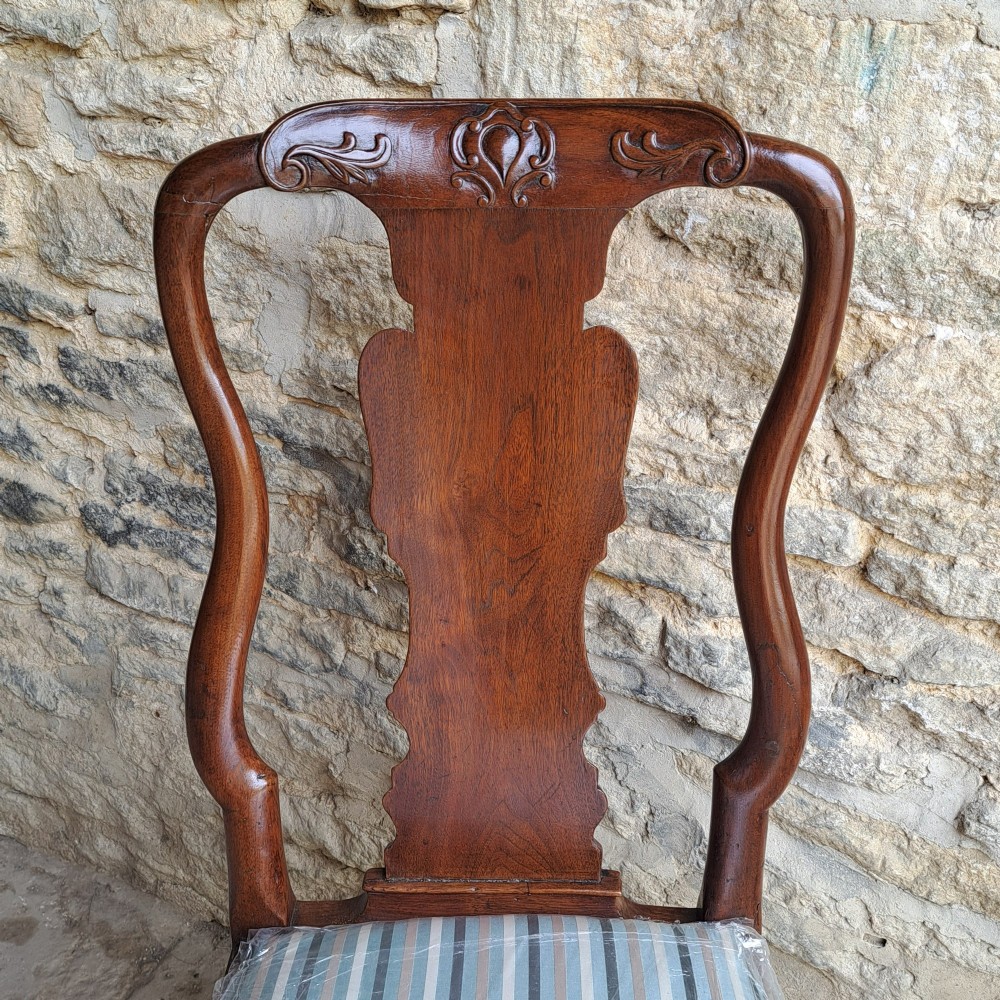 An 18th-century red walnut side chair with a shaped splat back, striped upholstered seat, and carved cabriole legs. View VII