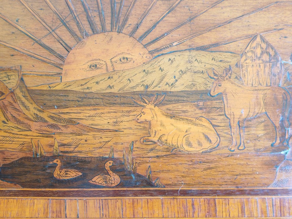 An 18th-century Dutch marquetry side table featuring a pictorial inlaid tabletop depicting a landscape, a floral drawer front, cabriole legs, and brass mounts. View VI