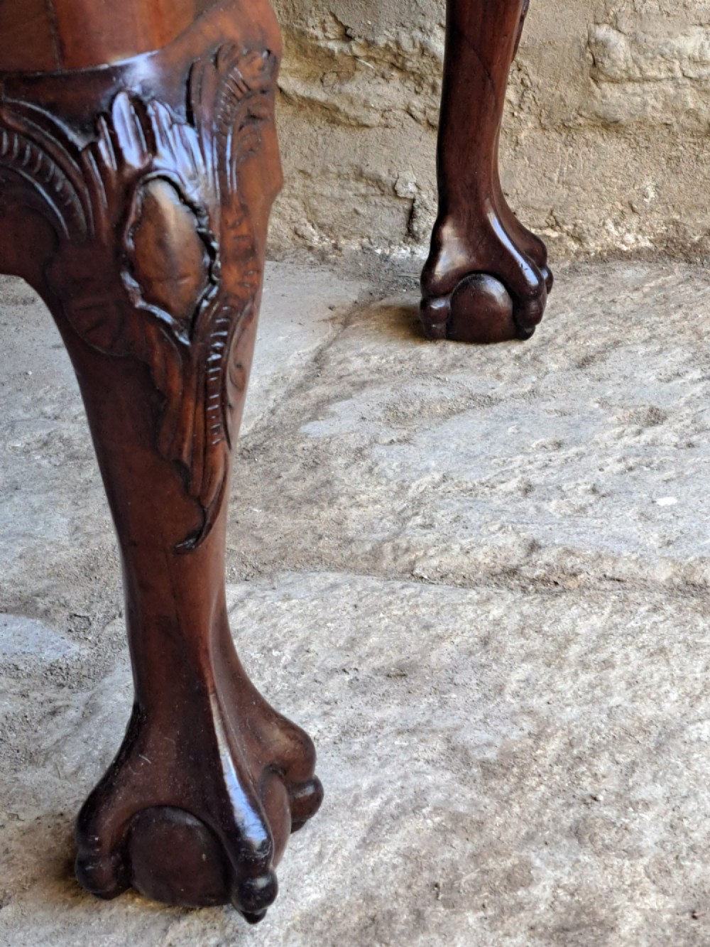A mid-18th century walnut side chair featuring an intricate carved splat back, purple velvet drop-in seat, and cabriole legs ending in ball and claw feet. View VII