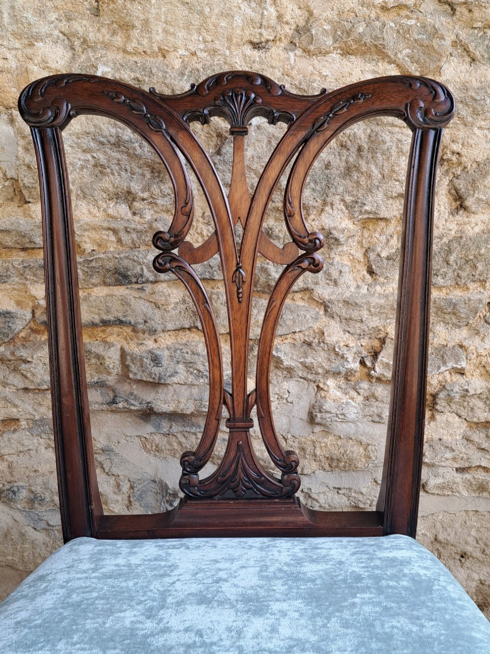 An Edwardian mahogany side chair featuring a carved pierced splat back, light blue velvet seat, and front cabriole legs ending in ball-and-claw feet. View III