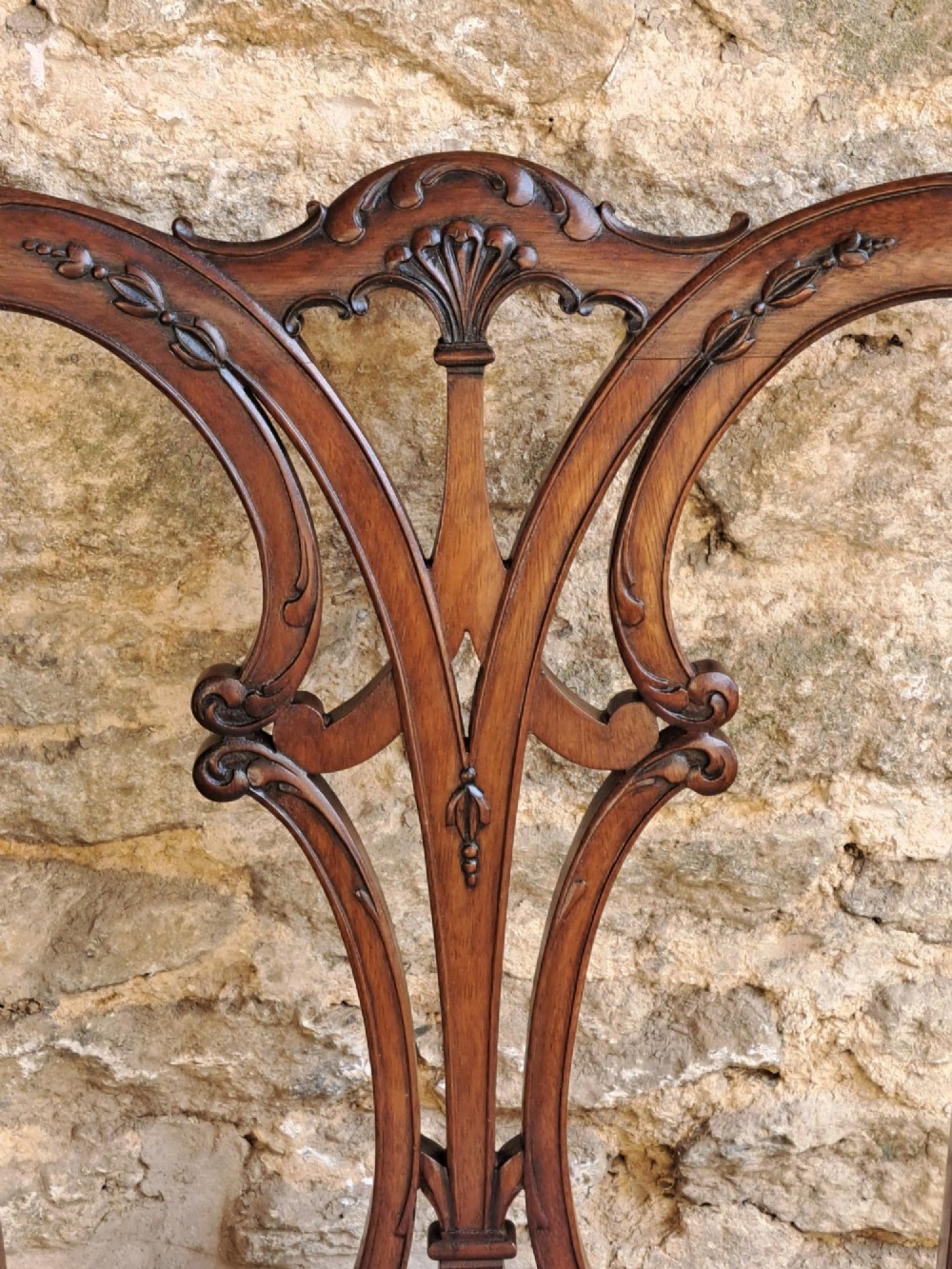An Edwardian mahogany side chair featuring a carved pierced splat back, light blue velvet seat, and front cabriole legs ending in ball-and-claw feet. View IV