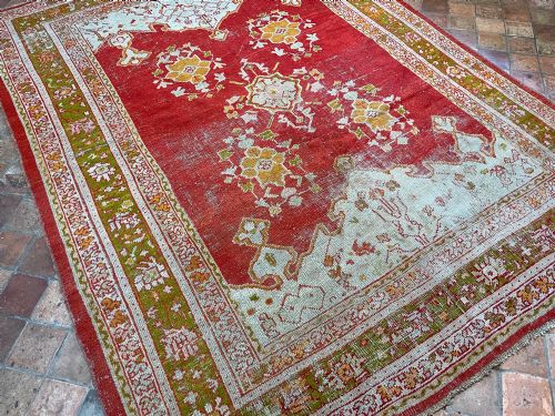 DISTRESSED ANTIQUE USHAK CARPET - ADDITIONAL PHOTO 1