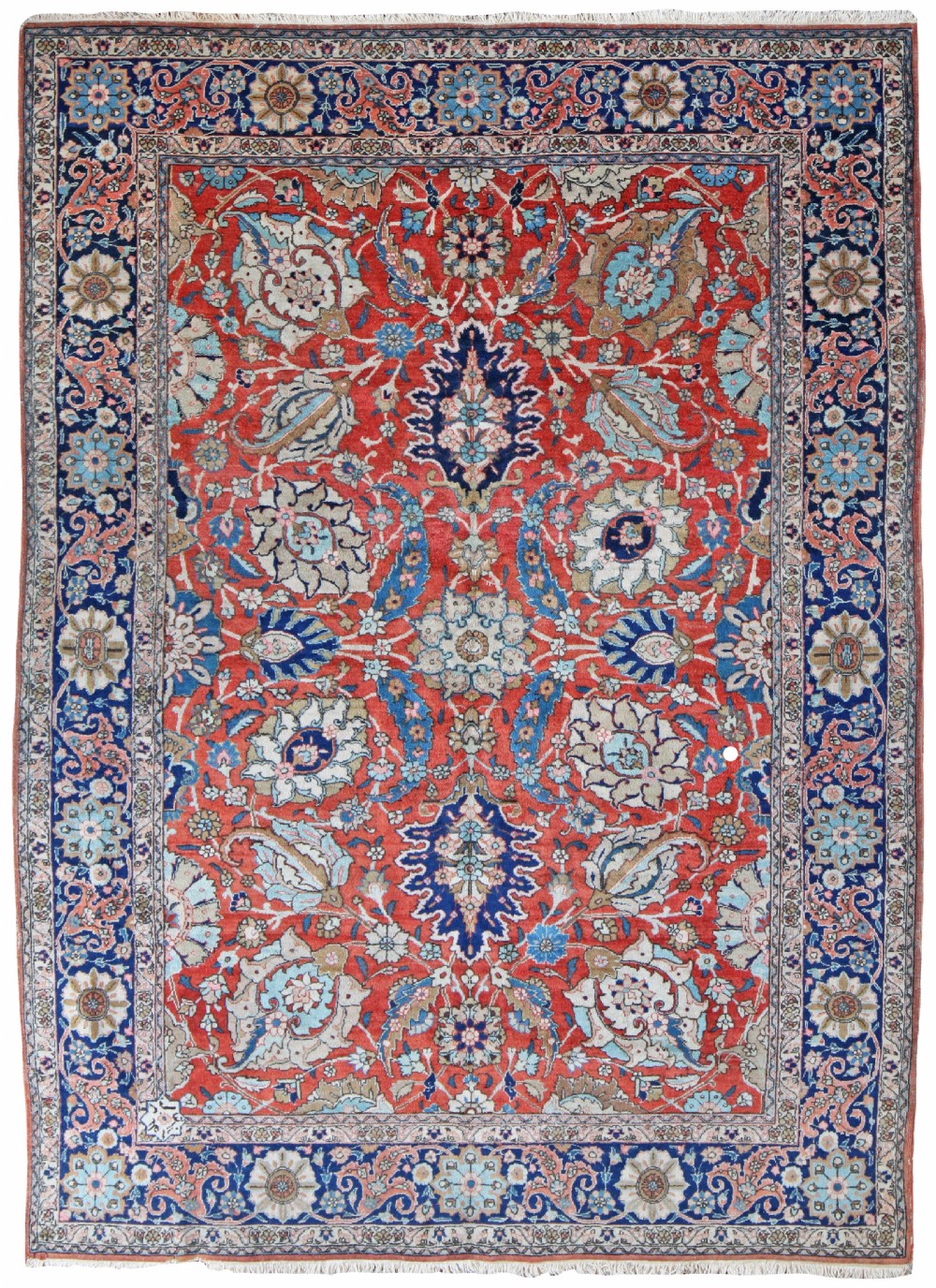 An antique hand-knotted Benlian Tabriz carpet featuring an intricate floral lattice pattern in red, navy blue, and ivory tones with a detailed multi-tiered border.